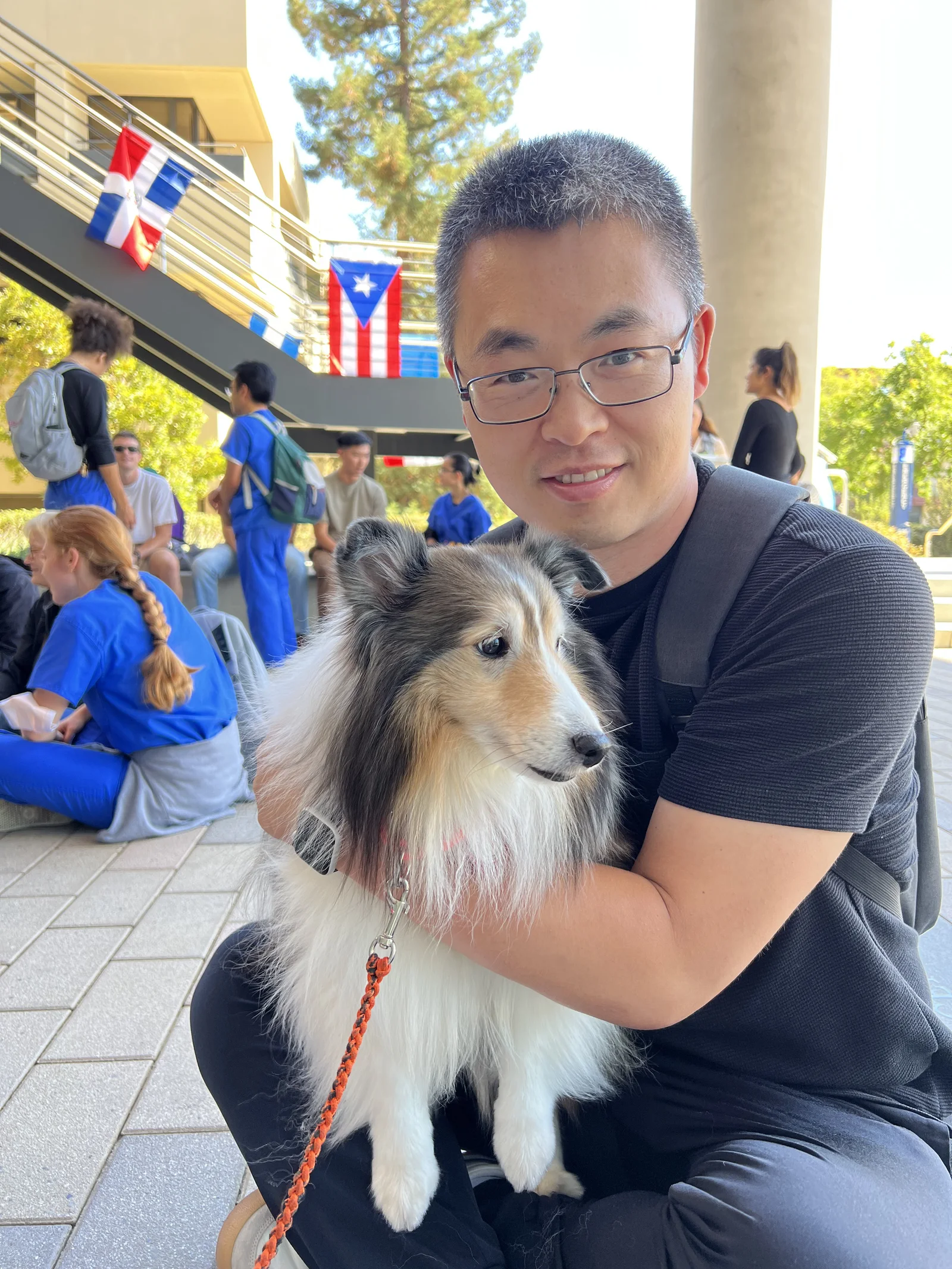 Traini team member with a dog